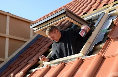 Pose de fenêtres de toit Velux à Portes